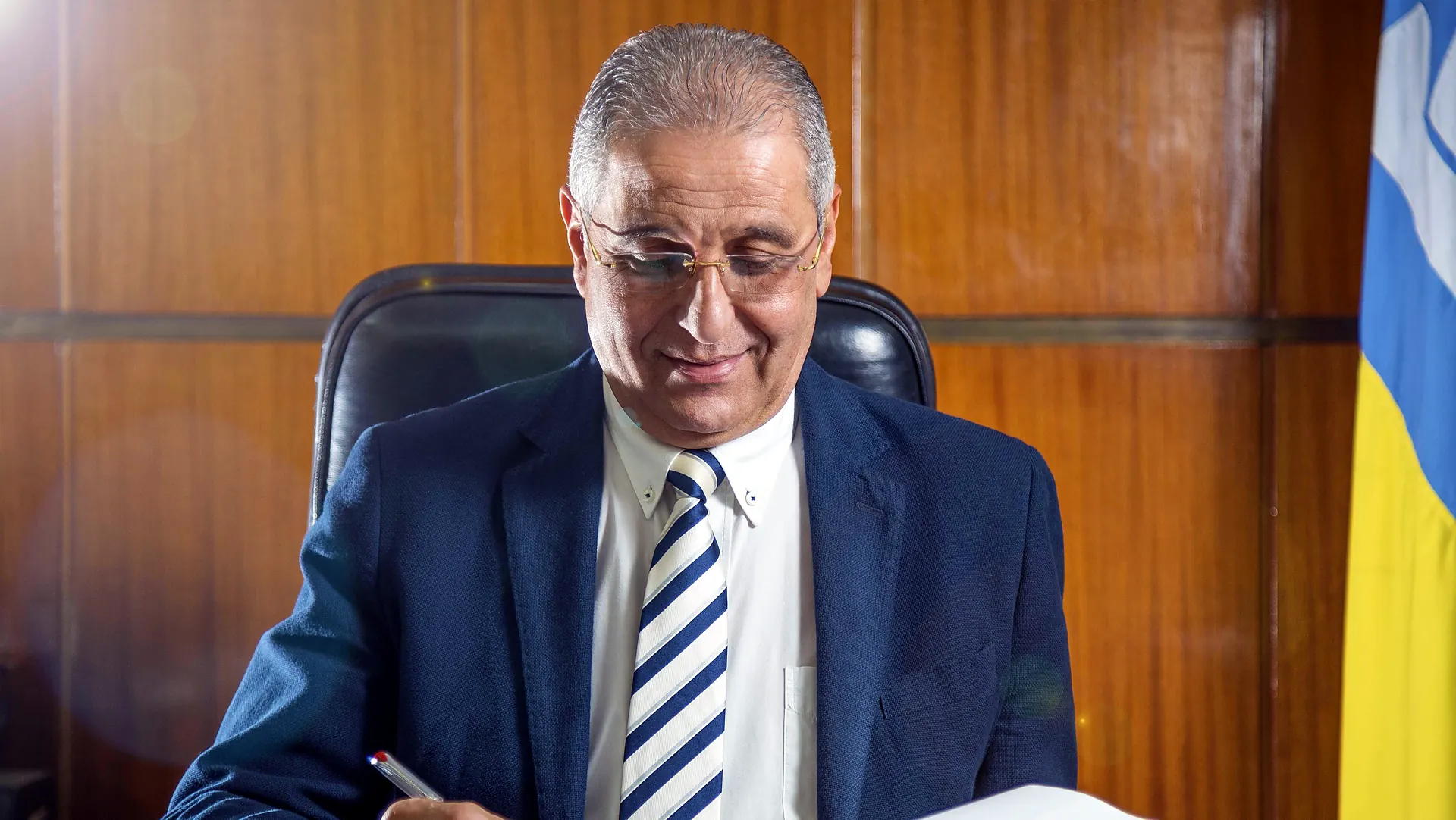 Chairman at his desk
